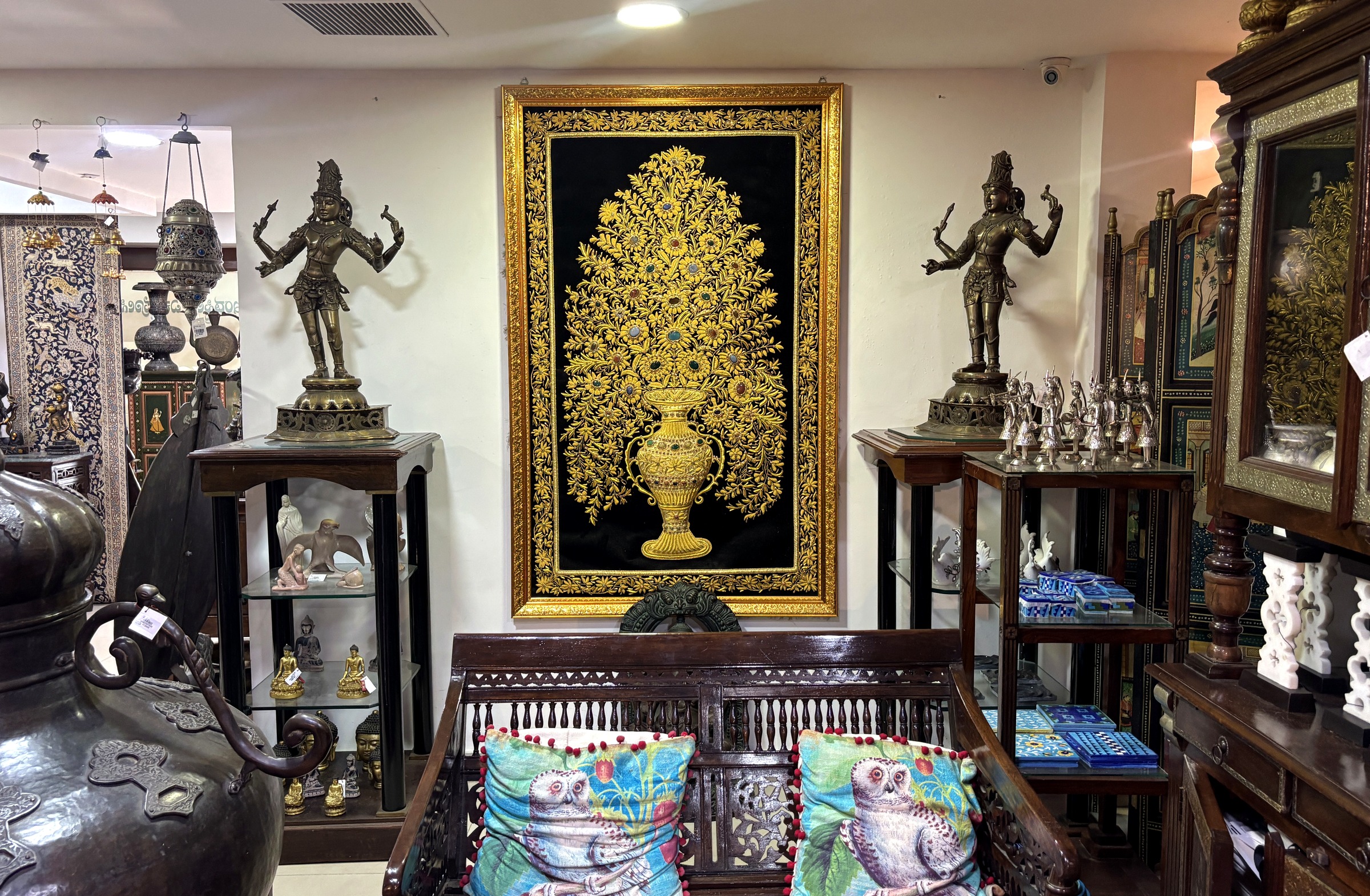 Carved wooden furniture and Indian art at CIE Bengaluru